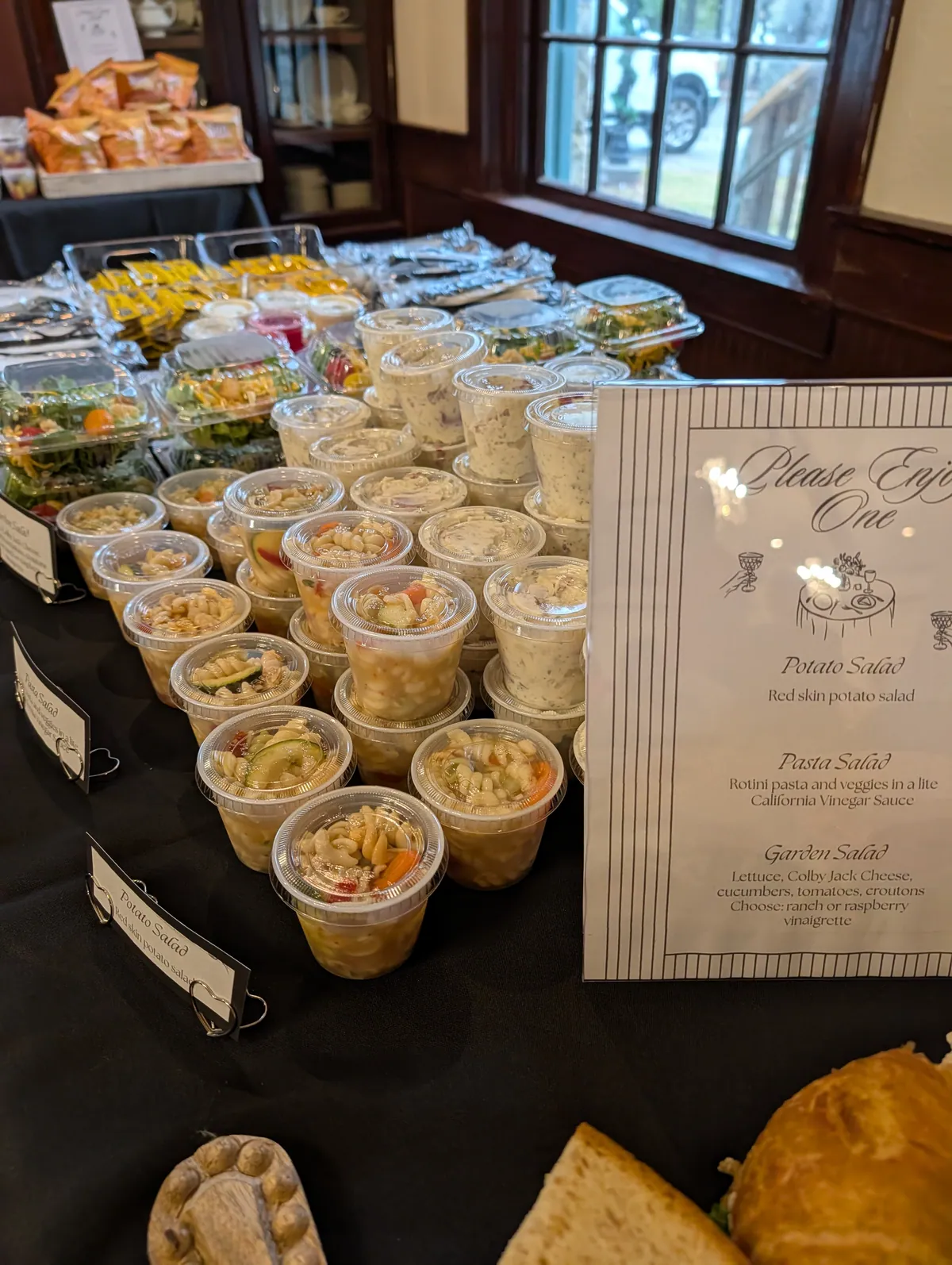 Fresh salads and deli sides prepared for catering